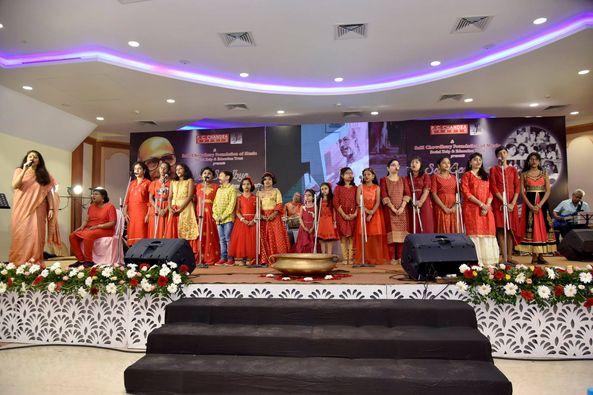 Smt Antara Chowdhury along with the children of Surodhwoni performing at PC Chandra Gardens, Kolkata